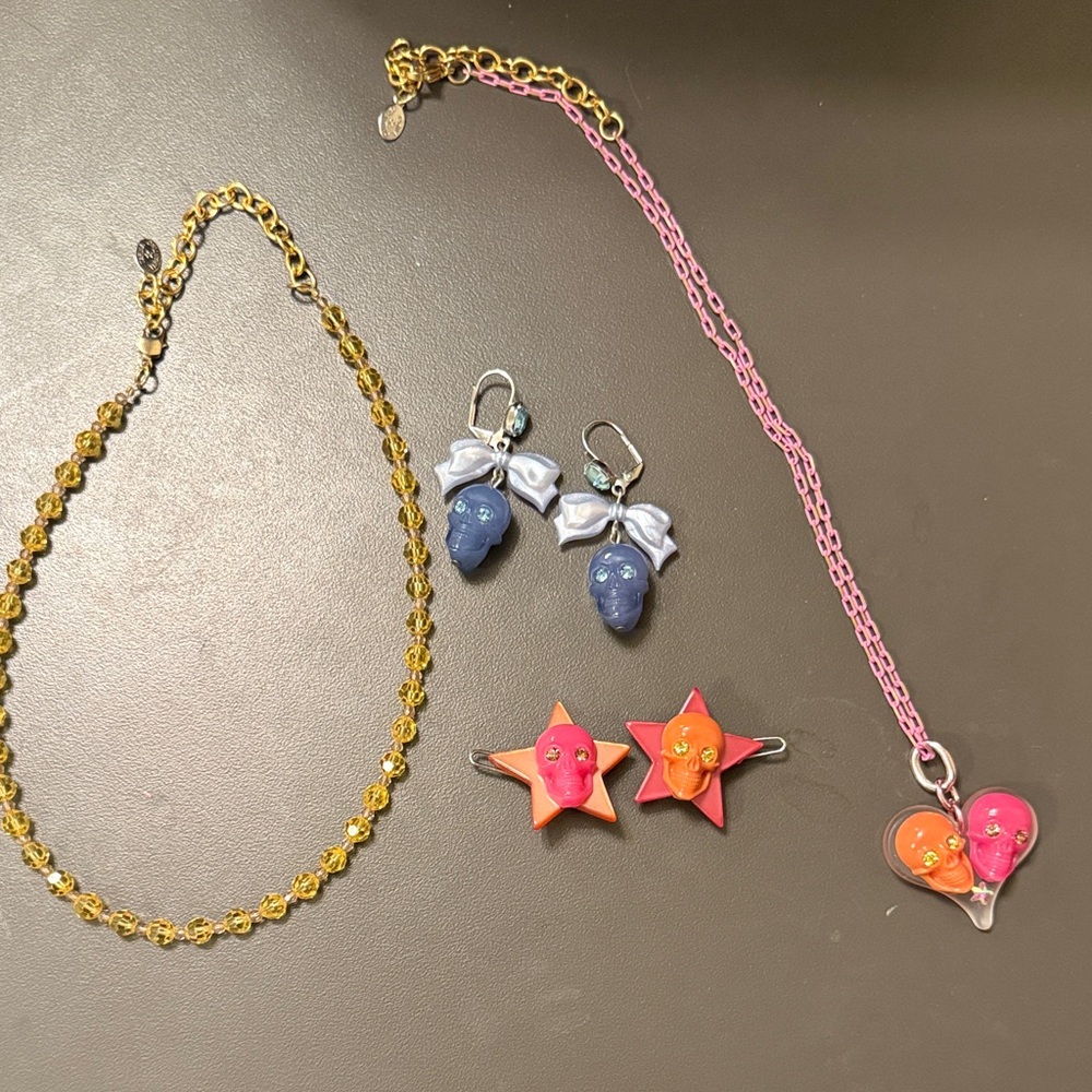 TT Skull heart necklace, hair clips, and yellow necklace